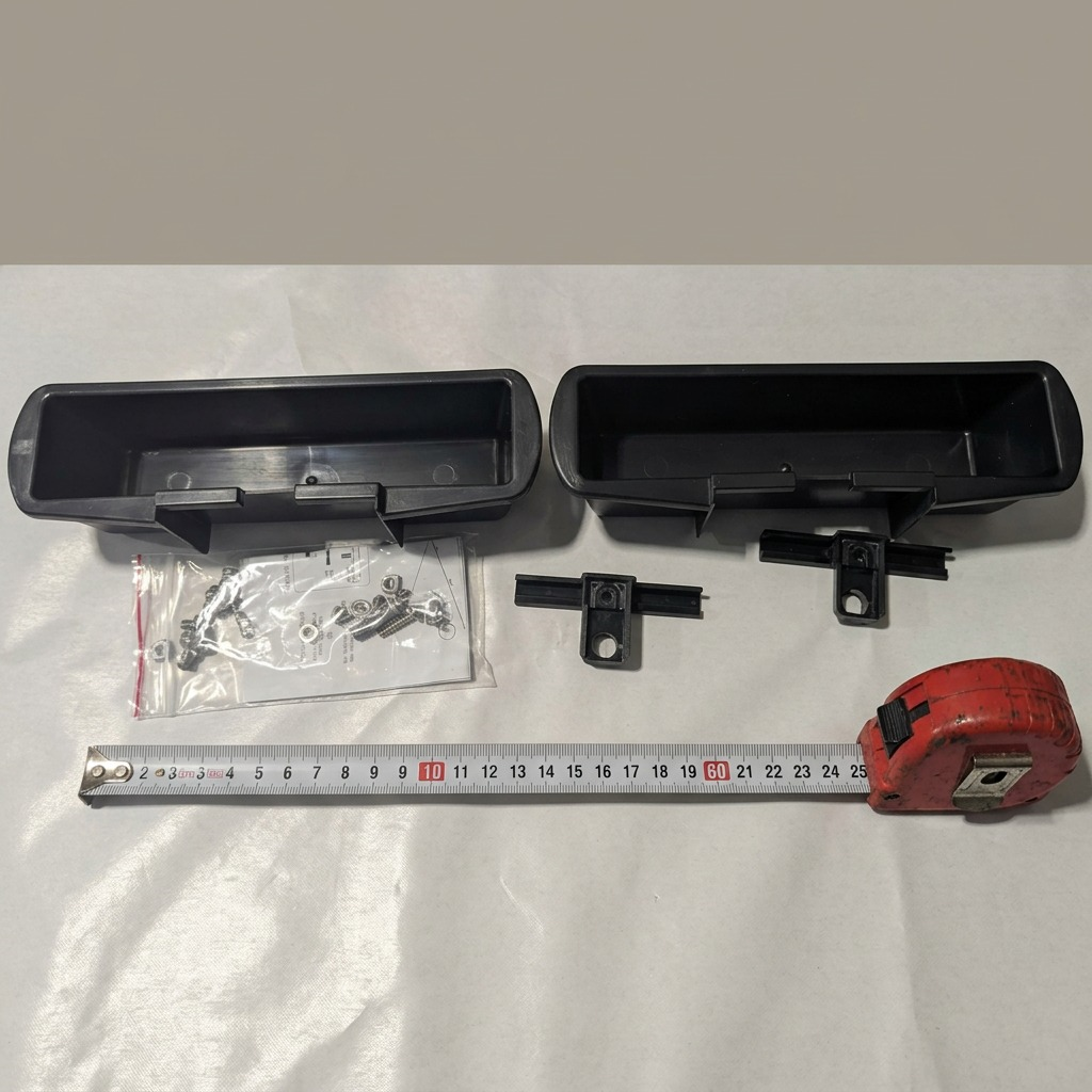 Scale reference of the RAKABOT TITAN 2 Containers and Black Hooks Kit beside a measuring tape.