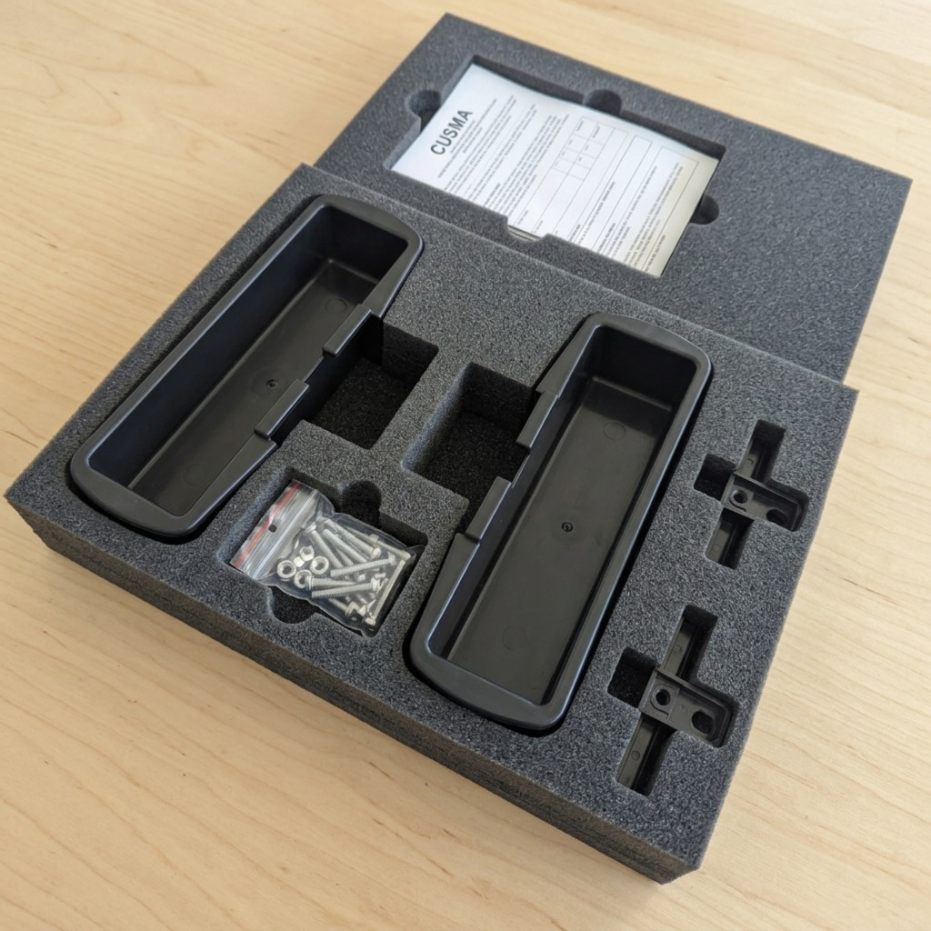 Rakabot Titan Expansion Kit components securely packed in protective foam with CUSMA documents.